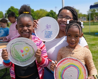 Family completing arts & crafts activities Family completing arts & crafts activities